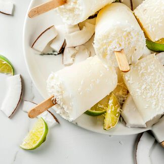 Coconut covered sorbet popsicles in a bowl