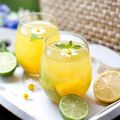 Lemonade with slices lemons in glasses