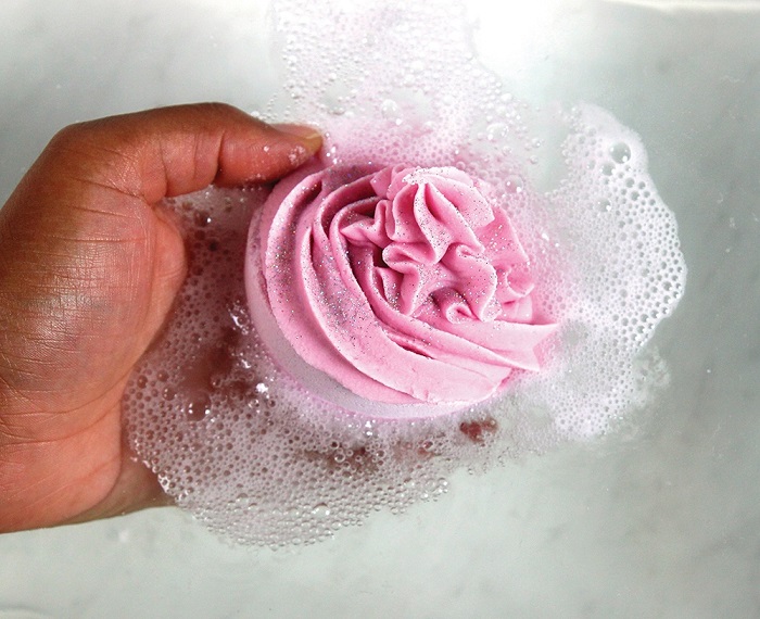 Cupcake bath bomb foaming in water