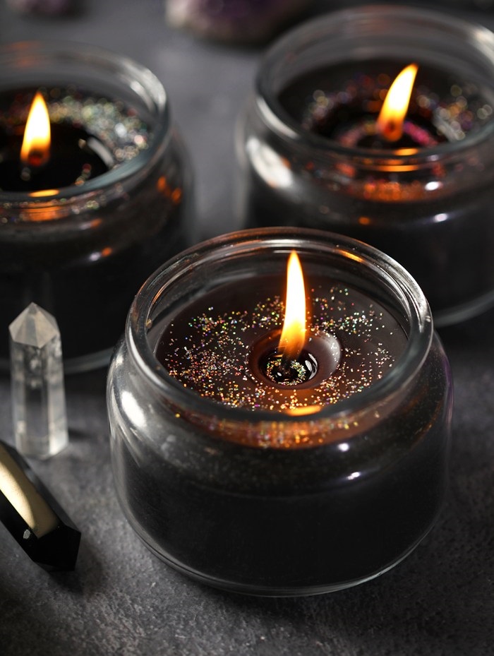 Lit black
                candles