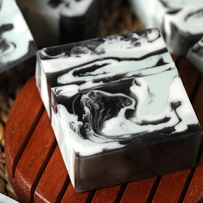 Black and white soap poured in a loaf mold