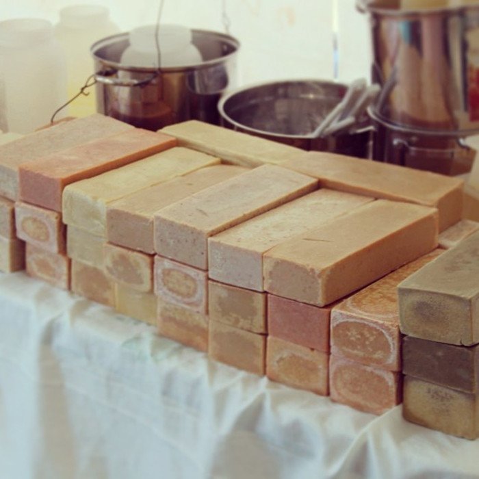 a stack of cold process soap for donation