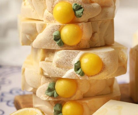 stacked bars of yellow soaps