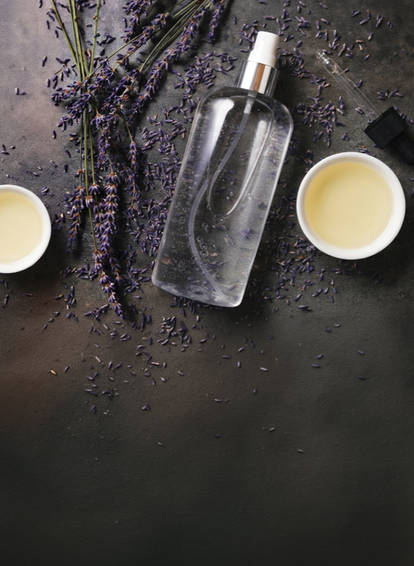 clear bottle of toner with lavender sprigs
