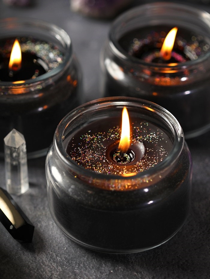 Lit black candles