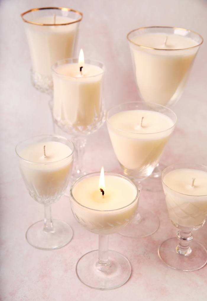 Candles in clear glass goblets