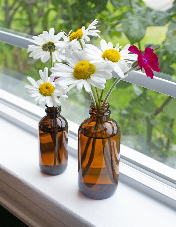 Upcycled amber bottle with flowers | Bramble Berry