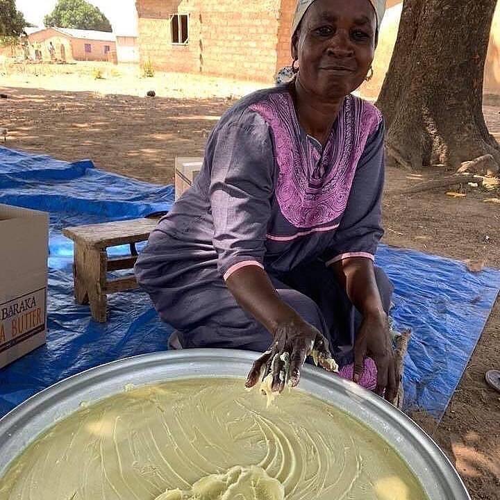 woman whipping raw shea butter